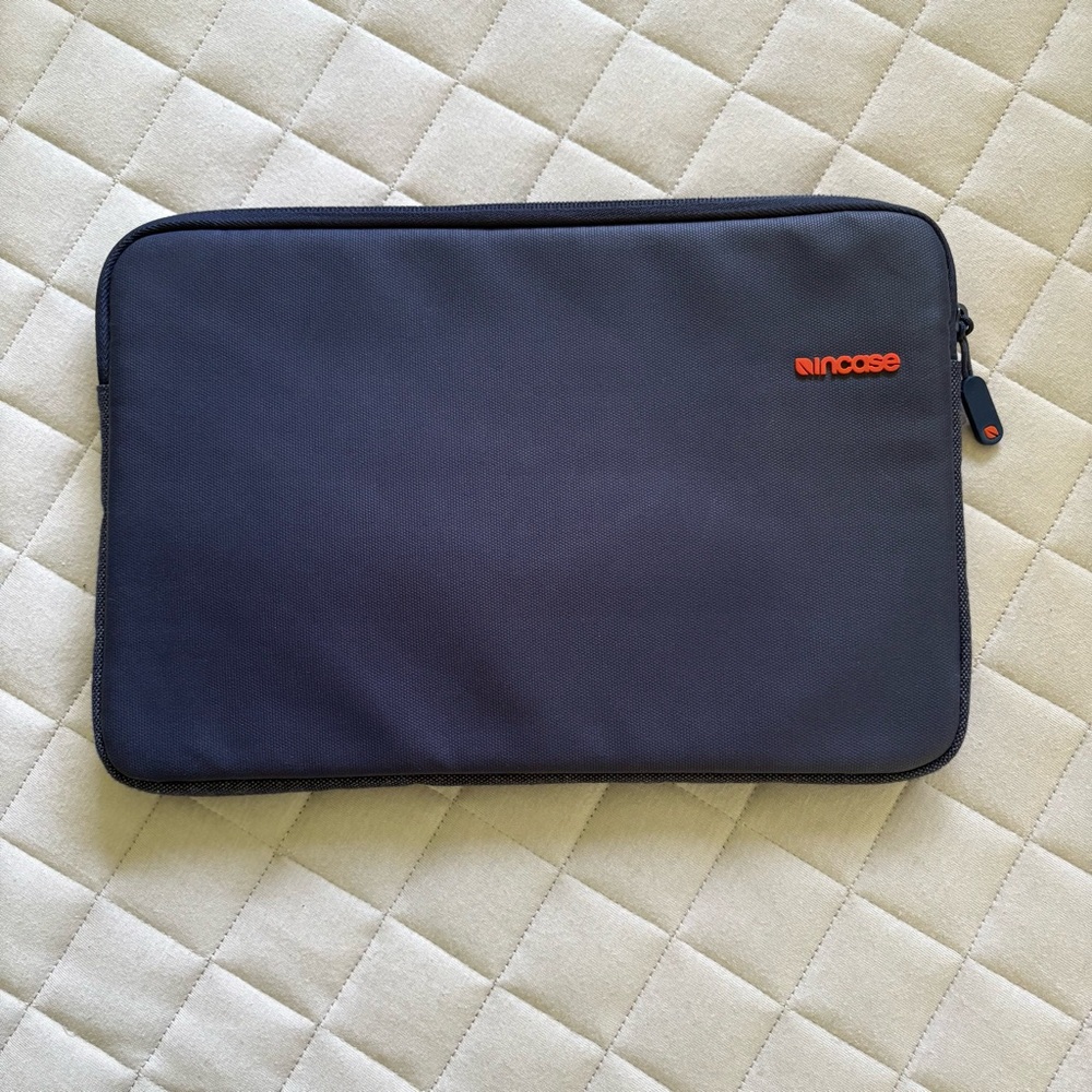 Incase Dark Blue Laptop Sleeve with Orange Logo